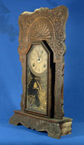 Antique wood clock case suffering from paint smear, mold, mildew, water damage, and dried-out finish. What to do?